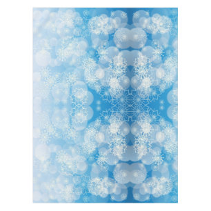 Mantel Navidades con copos de nieve en un fondo azul