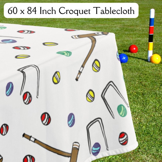 Mantel Picnic Croquet Vintage con iluminación caprichosa (This retro croquet party tablecloth features colorful, hand-drawn balls, mallets, and wickets.)