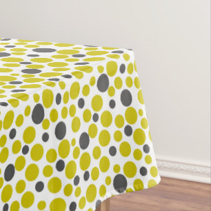 Mantel puntos de polka gris amarillo sobre fondo blanco