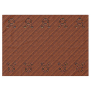 Mantel Símbolo zodiaco de Taurus sobre caoba como impresi