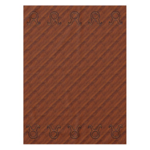 Mantel Símbolo zodiaco de Taurus sobre caoba como impresi