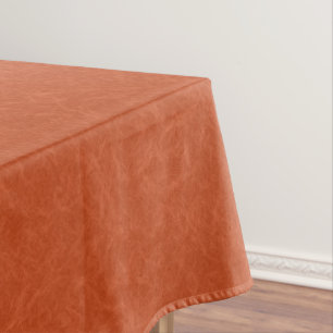 Mantel Superficie texturizada naranja con patrón de remol