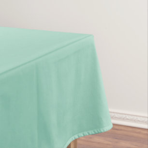 Mantel Un color sólido apagado a menta suave.