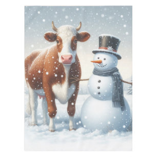 Mantel Vaca y muñeco de nieve en el campo invernal