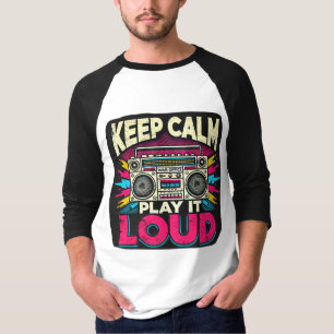 Mantén la calma y juega fuerte camiseta Raglan de