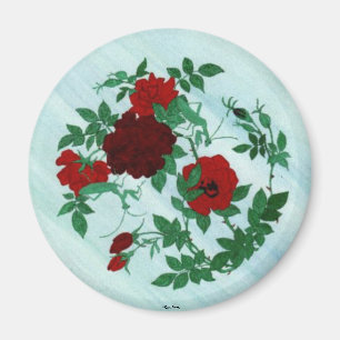 Mantis de oración y imán de rosas rojas