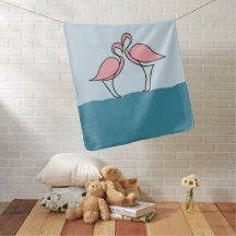 Dos flamencos rosas sobre el agua