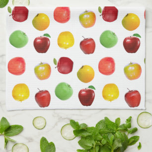 Manzanas Coloridas Naturales sobre Toalla Blanca d