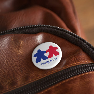 Manzanas de amor, botón azul y rojo