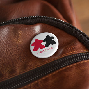 Manzanas de amor, botón rojo y negro