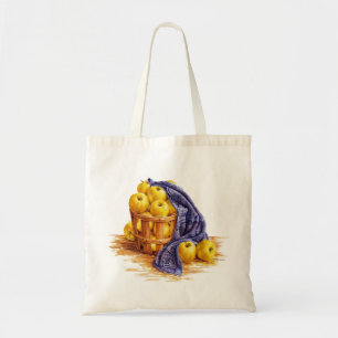 Manzanas doradas en la bolsa de tocador de la cana