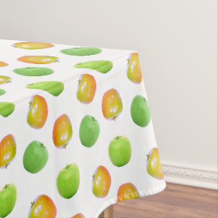 Manzanas verdes hermosas sobre mantel blanco