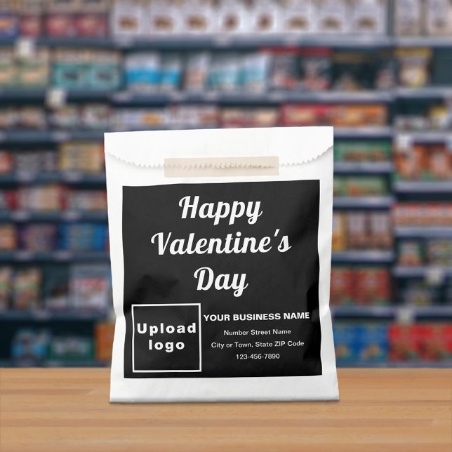 Marca comercial negra; Valentina; bolsa de papel (Black business brand with Valentine greeting on paper bag.)