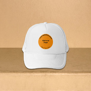 Marca de negocios de redondeo naranja en sombrero