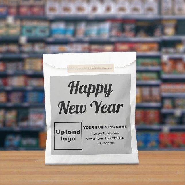 Marca de negocios gris, bolsa de papel de año nuev (Gray business brand with New Year greeting on paper bag)