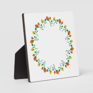 Marco redondo floral con flor rosa amarilla y roja