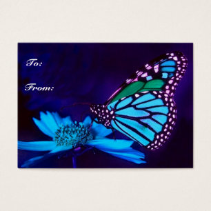 Mariposa en etiqueta de regalo de luz azul