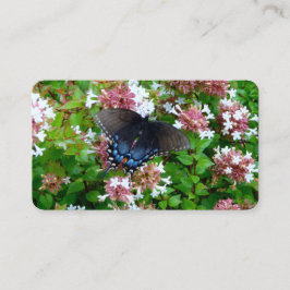 Mariposa en tarjetas de visita de flores