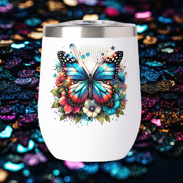 Mariposa y flores azules de bonito