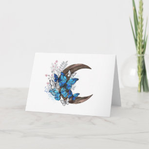 Mariposas azules en creciente de madera