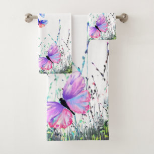 Mariposas de colores volando en toallas de baño de