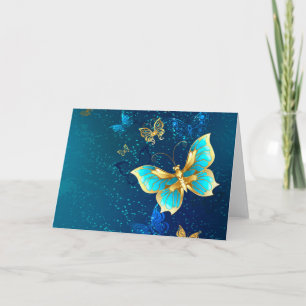 Mariposas doradas sobre fondo azul