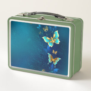 Mariposas doradas sobre fondo azul