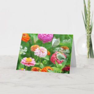 Mariposas en una tarjeta de saludo de jardín de Zi