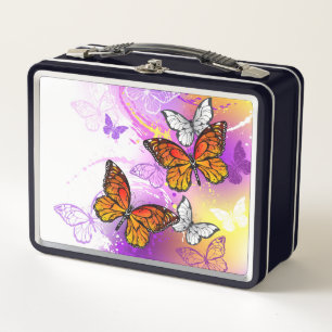 Mariposas monarcas en fondo morado