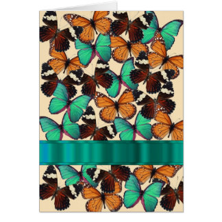 Mariposas verdes y naranjas