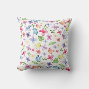 Mariposas y almohada de colores