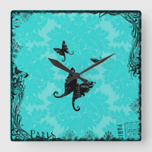 Mariposas y reloj de pared de París