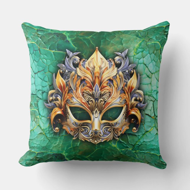 Máscara decorativa sobre almohada verde brillante (Anverso)