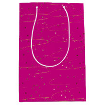 Bolsa de regalo de purpurina dorada y rosa intenso