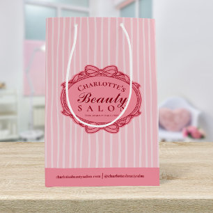 Mediana Elegante bolsa de regalo a rayas rosadas con marco