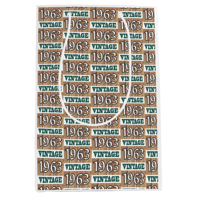 Mediana Nacido en 1963 con una bolsa de regalo (Anverso)