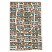 Nacido en 1965 con una bolsa de regalo