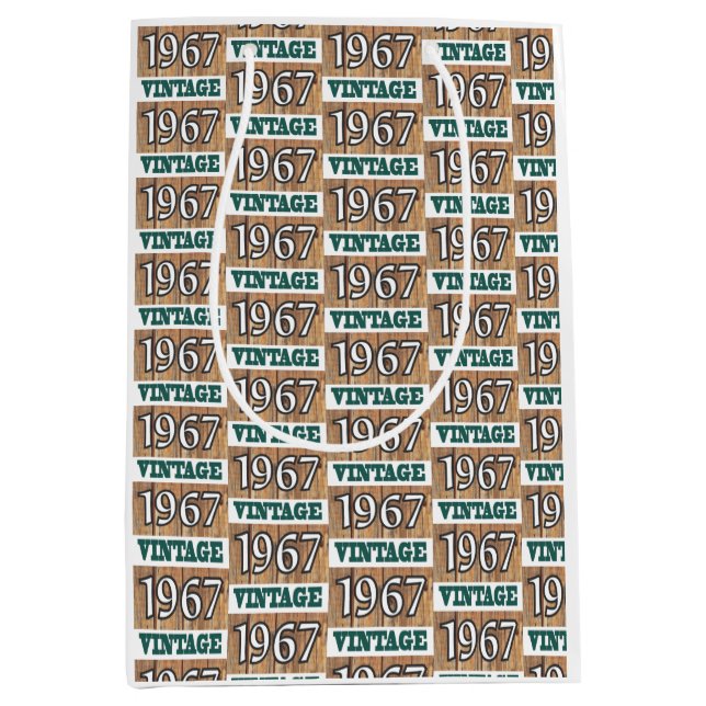 Mediana Nacido en 1967 con una bolsa de regalo (Anverso)