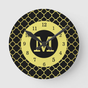 Mediano Reloj redondo monogramado de cuarzo dorado negro