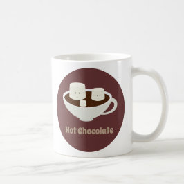 Melcochas en taza del chocolate caliente con