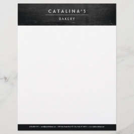 Membrete Texto Art Deco sobre madera negra