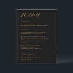 Menú Boda Romántico de Script Negro y Oro<br><div class="desc">Disfrute de la encarnación del romance moderno con nuestro moderno menú romántico negro y Boda dorado. Esta cautivadora obra maestra combina a la perfección el encanto contemporáneo con la elegancia atemporal, realzando su celebración en todos los detalles. Elegantemente adornado con delicado guión moderno de caligrafía, este menú desprende un aire...</div>