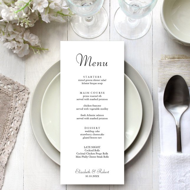 Menú de Boda Blanco Minimalista Moderno (Modern Minimalist White Wedding Menu on a beautiful white and silver wedding dinner table.)