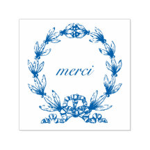 "merci" en el sello de autoreintado de Laurel Wrea
