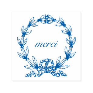 "merci" en el sello de autoreintado de Laurel Wrea