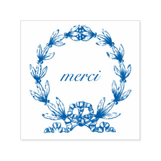 "merci" en el sello de autoreintado de Laurel Wrea