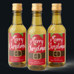 Merry Christmas Santa Elf Suit Nombre personalizad<br><div class="desc">Merry Christmas Santa Elf Suit Personalized Name Bottle Labels Pegatinas presenta un traje de Santa Elf con el texto "Feliz Navidad" en un popular y moderno guión con letras blancas a mano. Añada el nombre de su familia o de la compañía en la base para un regalo personalizado. Edite o...</div>