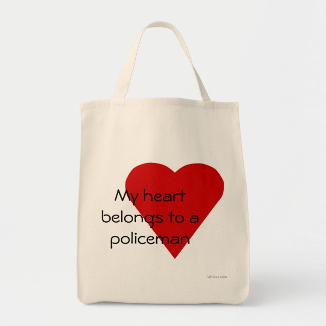 Mi corazón pertenece a un bolso del policía (Frente)