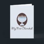 Mi primera tarjeta de felicitación Chanukah Hanukk<br><div class="desc">Una menorah azul claro y bonito sobre un fondo marrón oscuro que celebra el primer Festival de las Luces de los bebés sobre prendas de vestir y papelería Hanukkah para niños y bebés que hacen adorables regalos de Chanukah.</div>