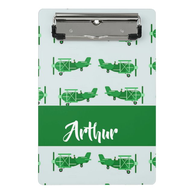 Minicarpeta De Pinza Aviones voladores verdes sobre azul (Anverso)